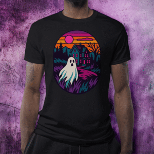 Black t-shirt featuring a vibrant graphic of a cute ghost near a haunted house at sunset, with pink, orange, and purple accents.