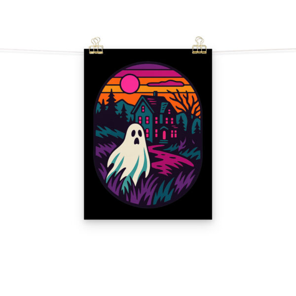 Ghostly Getaway haunted house art print hanging on a plain wall in 12x16 size.