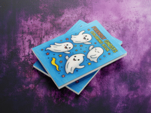 Digital coloring book cover featuring cute, friendly ghost illustrations and playful spooky font.